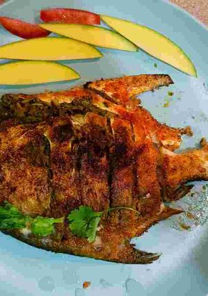 A picture of Stuffed Green Pomfret Delight: Crispy, Spicy, and Irresistible.