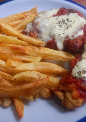 Una foto de Marineras de cerdo a la napolitana