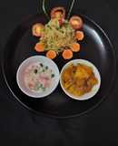 Fried rice doi potato raita and salad