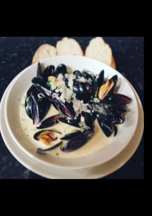 A picture of Moules Marinere with Cream, Garlic and Parsley.