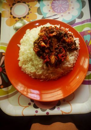 A picture of Boiled rice and vegetable stew.