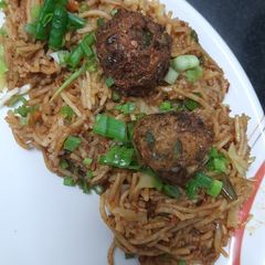 A picture of Triple Schezwan Fried Rice.
