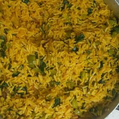 A picture of Unripe tomatoes jollof rice.