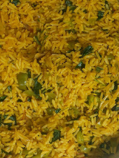 A picture of Unripe tomatoes jollof rice.
