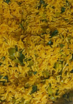 A picture of Unripe tomatoes jollof rice.