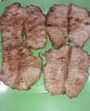 Bistec de lomo de cerdo, en salsa de soya