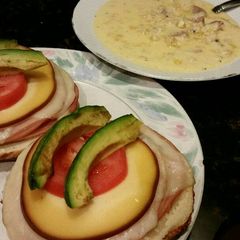 A picture of Brad's open faced sandwich with sausage corn chowder.