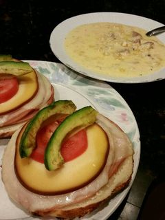 A picture of Brad's open faced sandwich with sausage corn chowder.