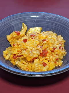 Una foto de Risotto integral de bacalao con piquillo