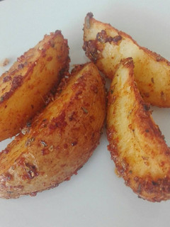 Una foto de Patatas cajún al horno