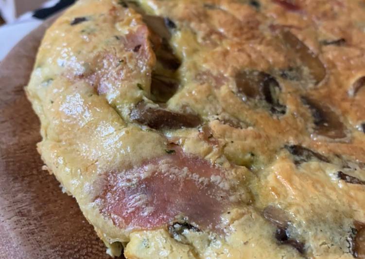 Frittata al forno con Champion e prosciutto cotto profumata al pepe di Jamaica e zenzero