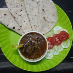 Urad dal and nonya saag gosht A picture of Urad dal and nonya saag gosht.