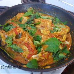 A picture of Ikan woku (fish in herbal curry).