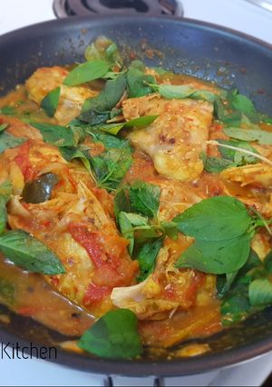 A picture of Ikan woku (fish in herbal curry).