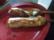 Una foto de banderillas de hot cakes
