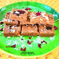A picture of Wheat Flour Rose Dryfruits Gud Papdi / Sukhdi - Gujarat Traditional Simple Special Sweet Soft Sukhdi.