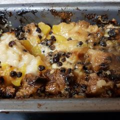 A picture of My Peach Bread Pudding with Rum & Raisin Sauce.