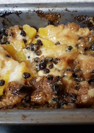 A picture of My Peach Bread Pudding with Rum & Raisin Sauce.