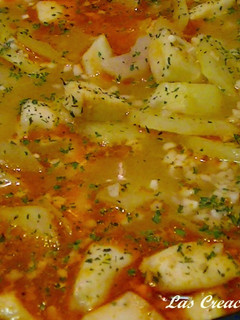 Una foto de Guiso de pota con patatas
