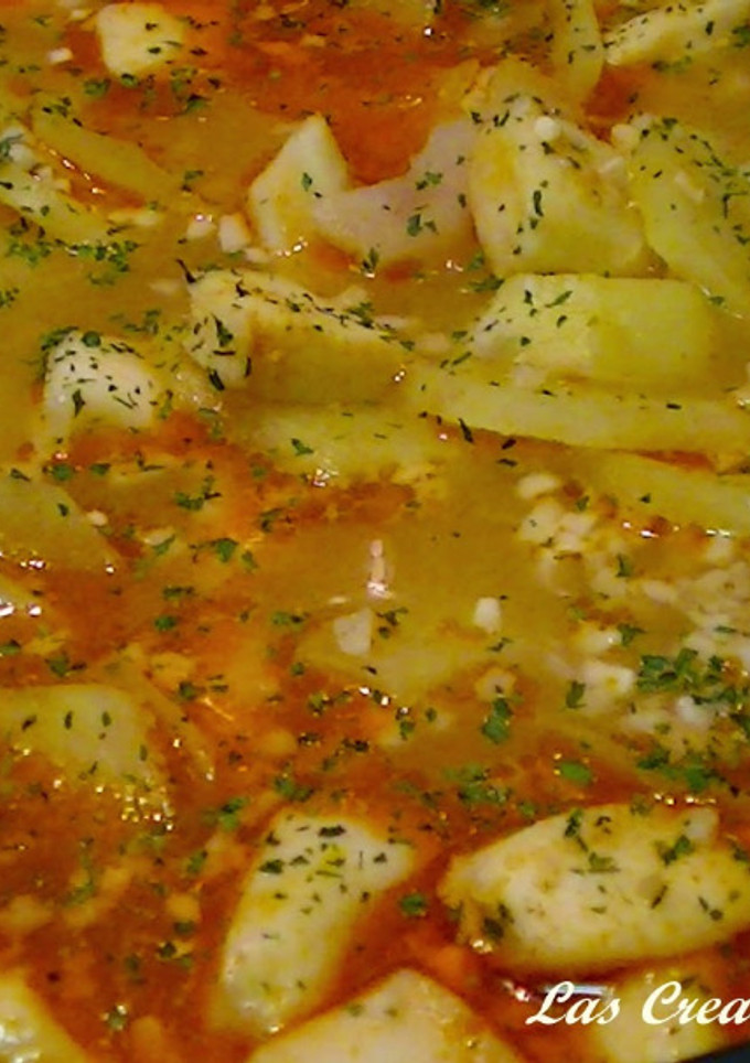 Una foto de Guiso de pota con patatas