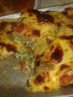 Una foto de Tortilla de berenjena, queso mozzarella y aogao de tomate