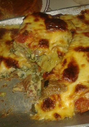 Una foto de Tortilla de berenjena, queso mozzarella y aogao de tomate