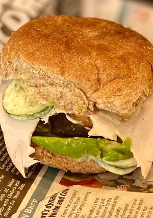 A picture of Sandwich battle - ultimate turkey and avocado sandwich.