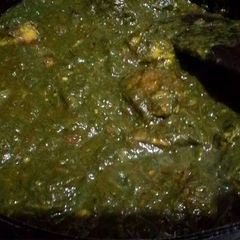 A picture of Palak with lauki koftas.