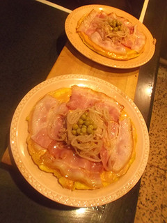 Una foto de Tortilla japonesa, con complejo de pizza