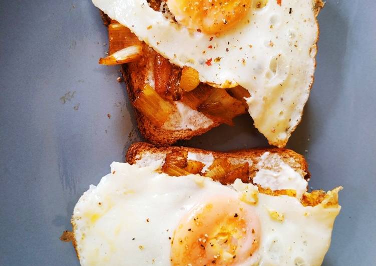 Eggs and leek on toast breakfast