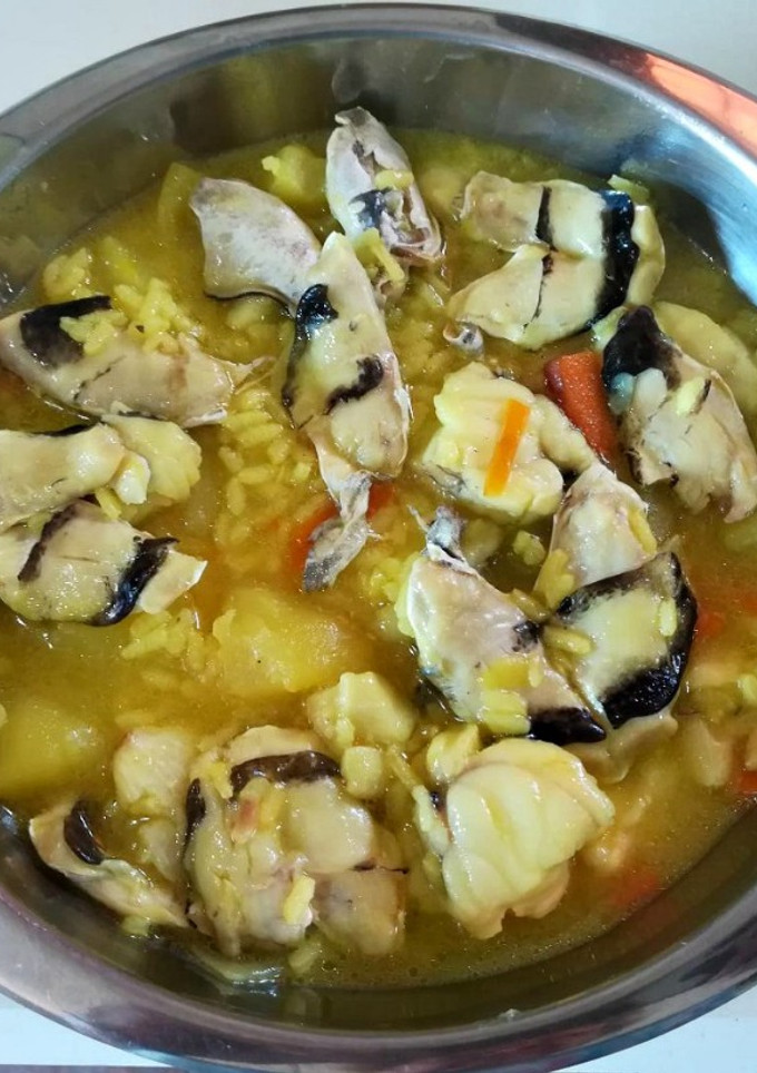 Una foto de Arroz con rape y cocochas
