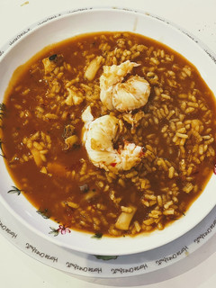 Una foto de Arroz de langosta