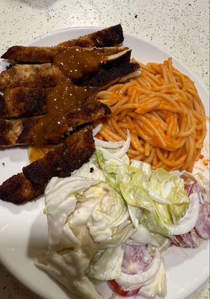 Una foto de Milanesa de Pollo Empanizado