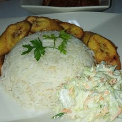 A picture of White rice and stew.
