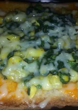 A picture of Spinach corn open sandwich.