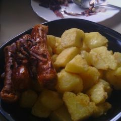 A picture of Baked Potatoes With Sausage and Caramelized Onions.