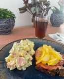 Chuleta a la naranja con ensalada Alemana