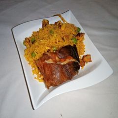 Palm oil Fried Rice A picture of Palm oil Fried Rice.