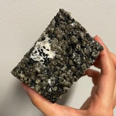 A picture of Black sesame paste rice krispies.