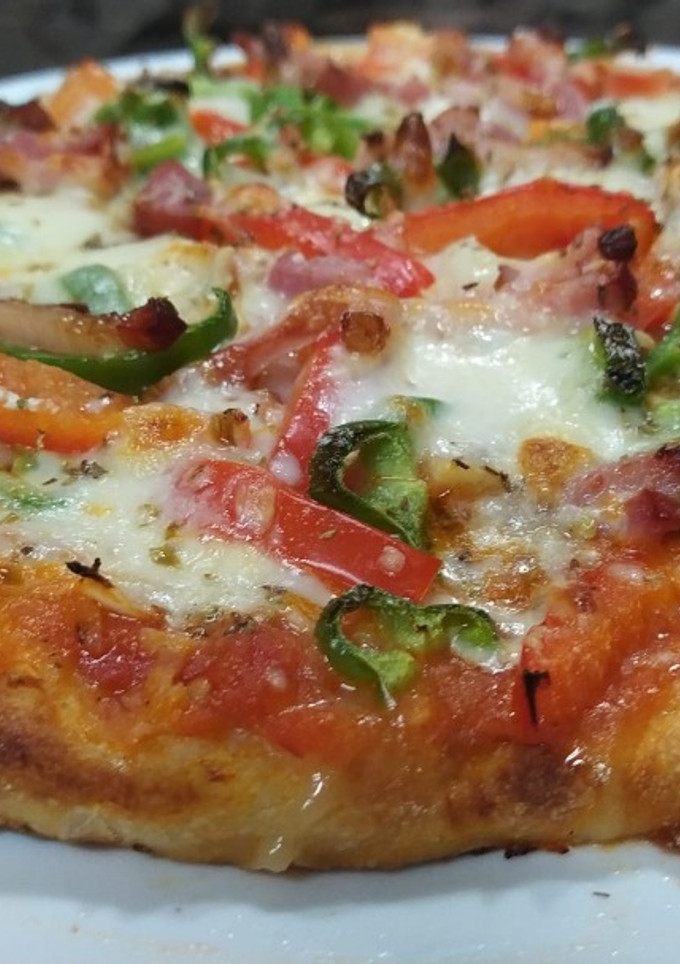 Una foto de Pizza con masa estilo napolitana