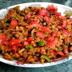 A picture of Nuty and veg red flattened rice.