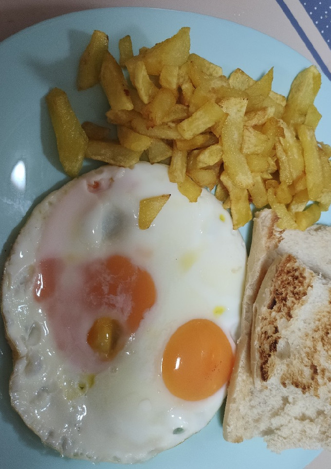 Una foto de Huevos&patatas fritas