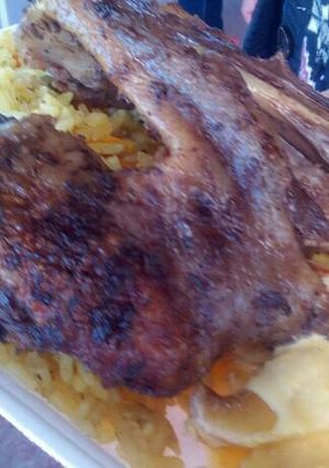 Una foto de Arroz con pato a la huancaina