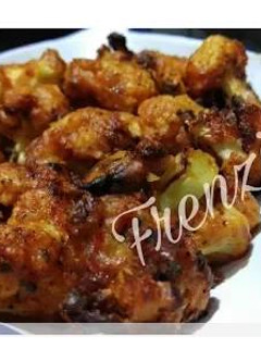 A picture of Baked cauliflower in hot sauce.