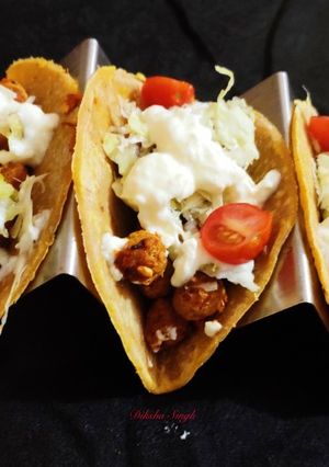 A picture of Soft tacos with soya and bean filling.