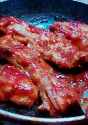 Una foto de Costilla de cerdo en salsa de tomate