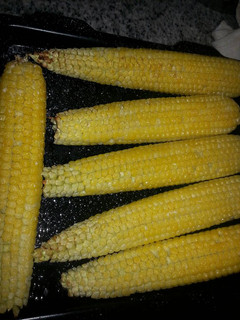 Una foto de Mazorcas de maíz al horno