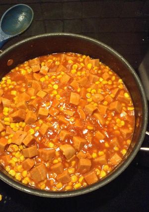 A picture of Spam and corn w/ tomato gravy.