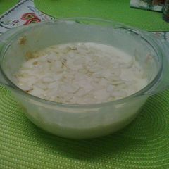 A picture of White Chocolate Mousse with Strawberry Jam.
