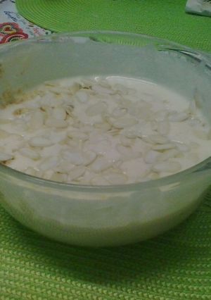 A picture of White Chocolate Mousse with Strawberry Jam.